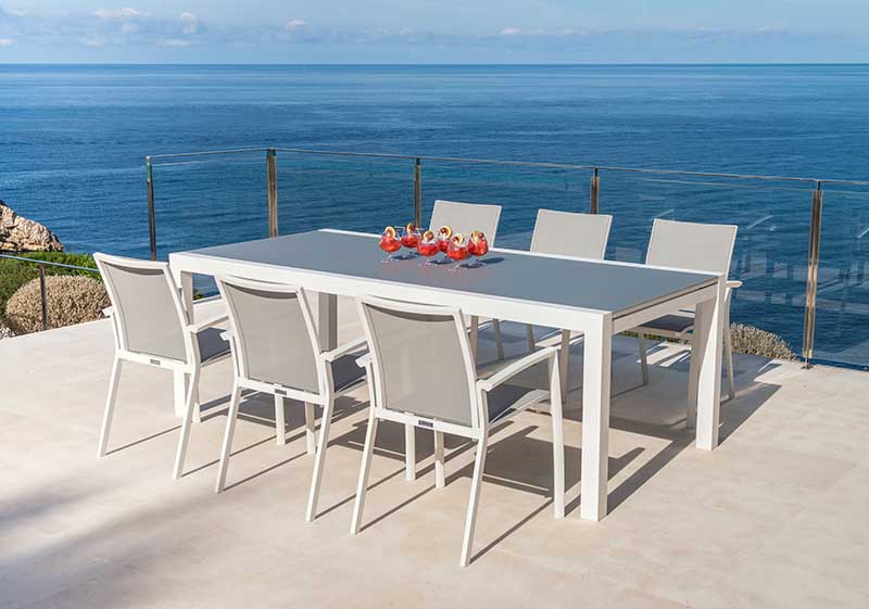 Set Tisch Livorno Glas 220/330x106cm + 6 Stapelsessel Sevilla weiß